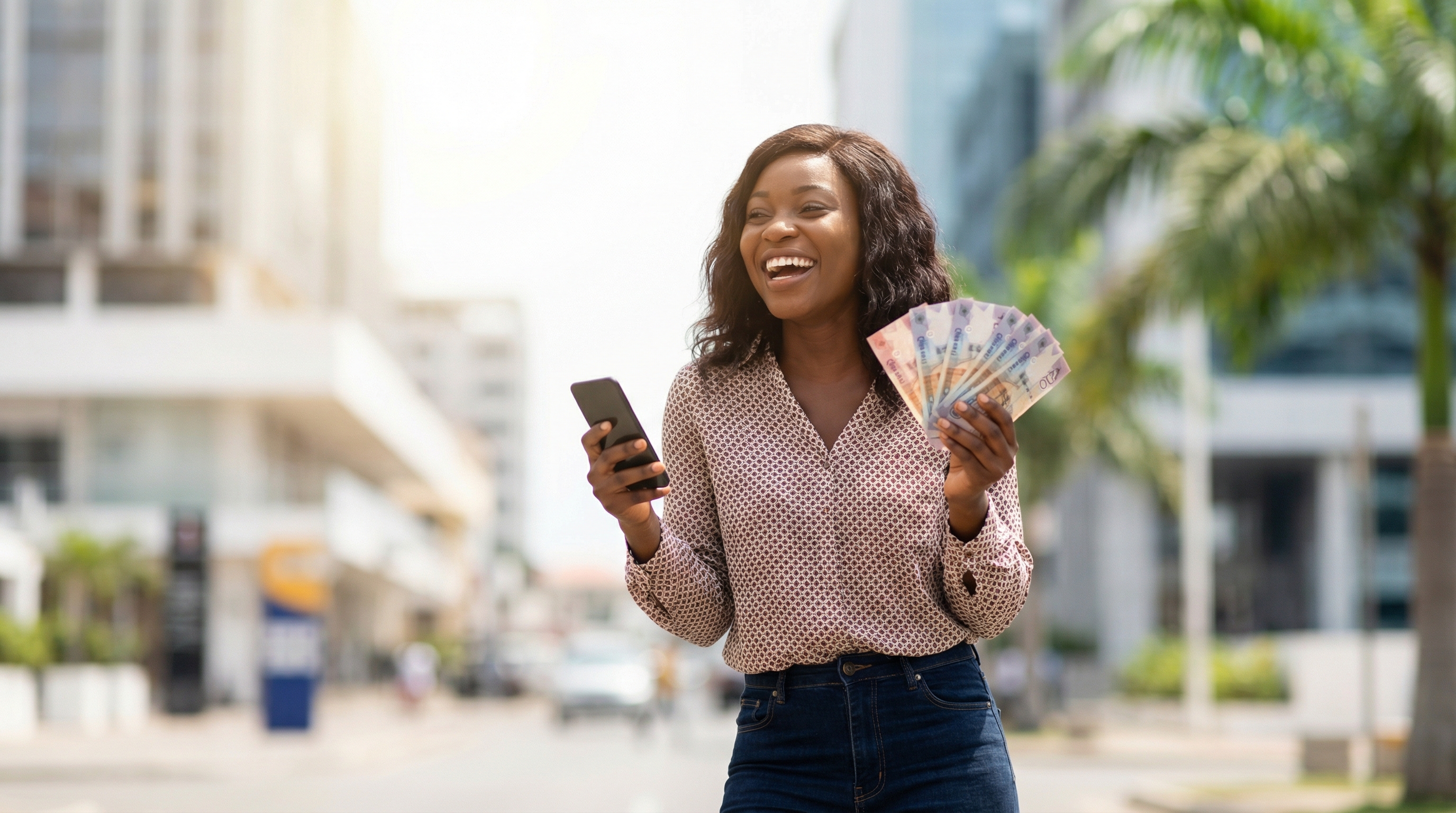 Happy Ghanaian woman earning money